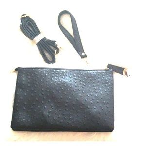 Brand new black 12 inch clutch.